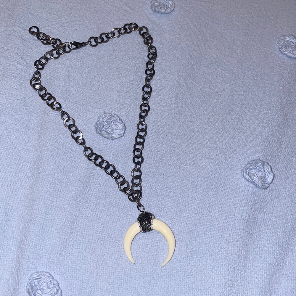 Raw and Rebellious brand shark tooth necklace